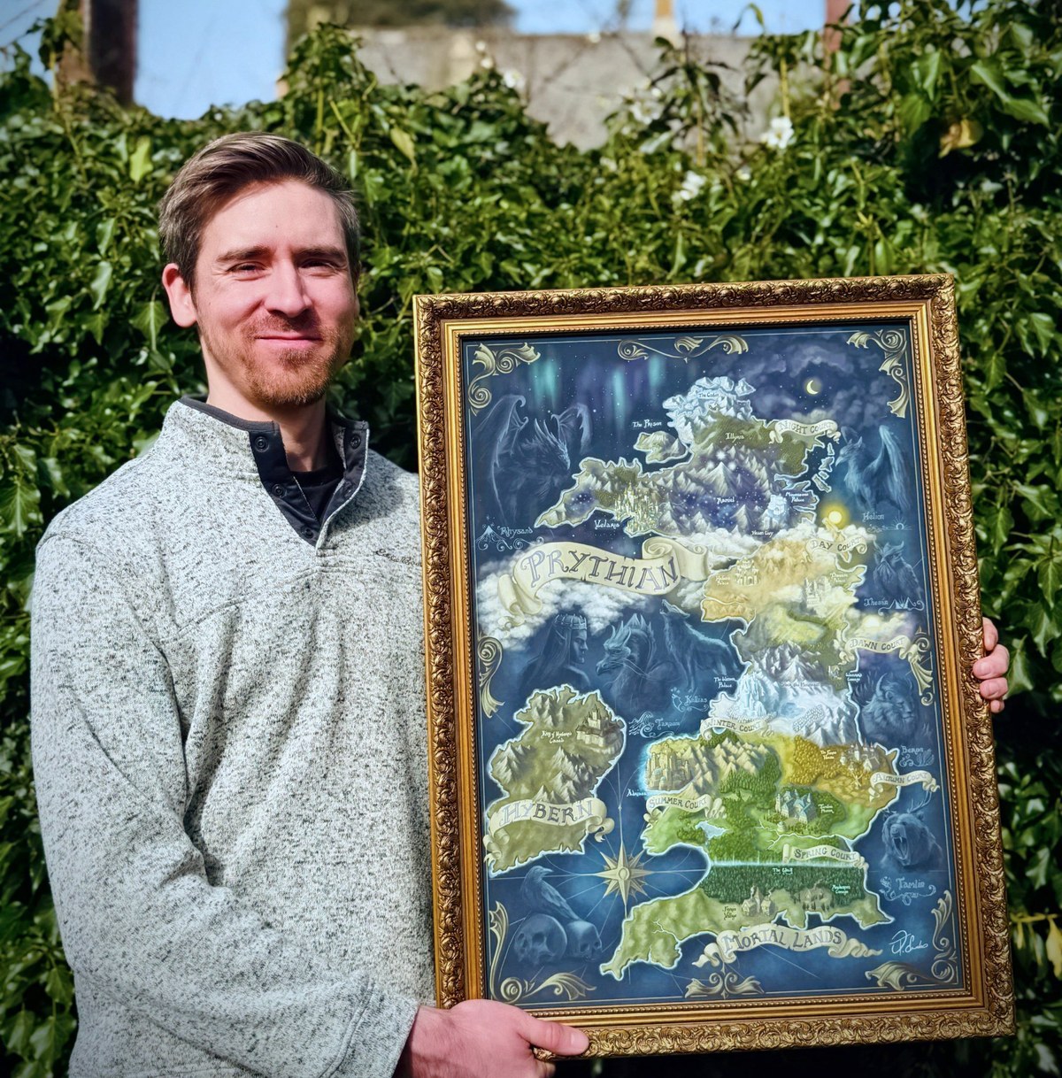 Oliver Saunders holding the Prythian map